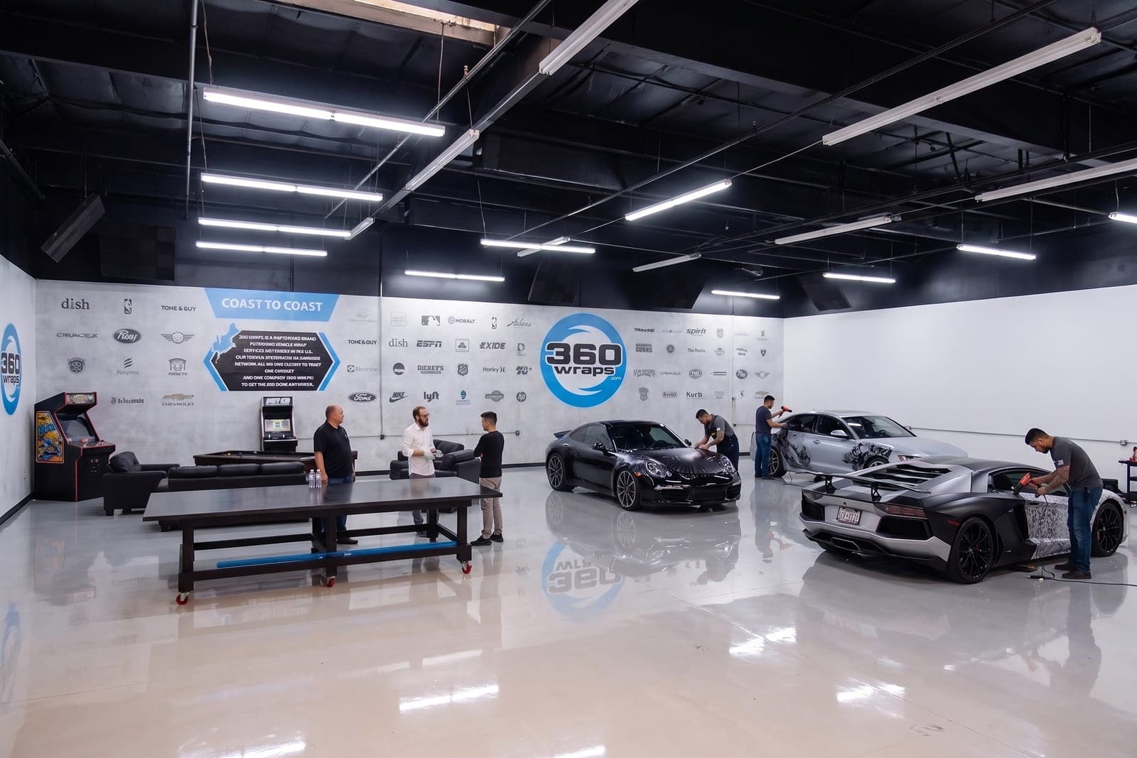 360 Wraps workshop — vehicles and installers on the production floor